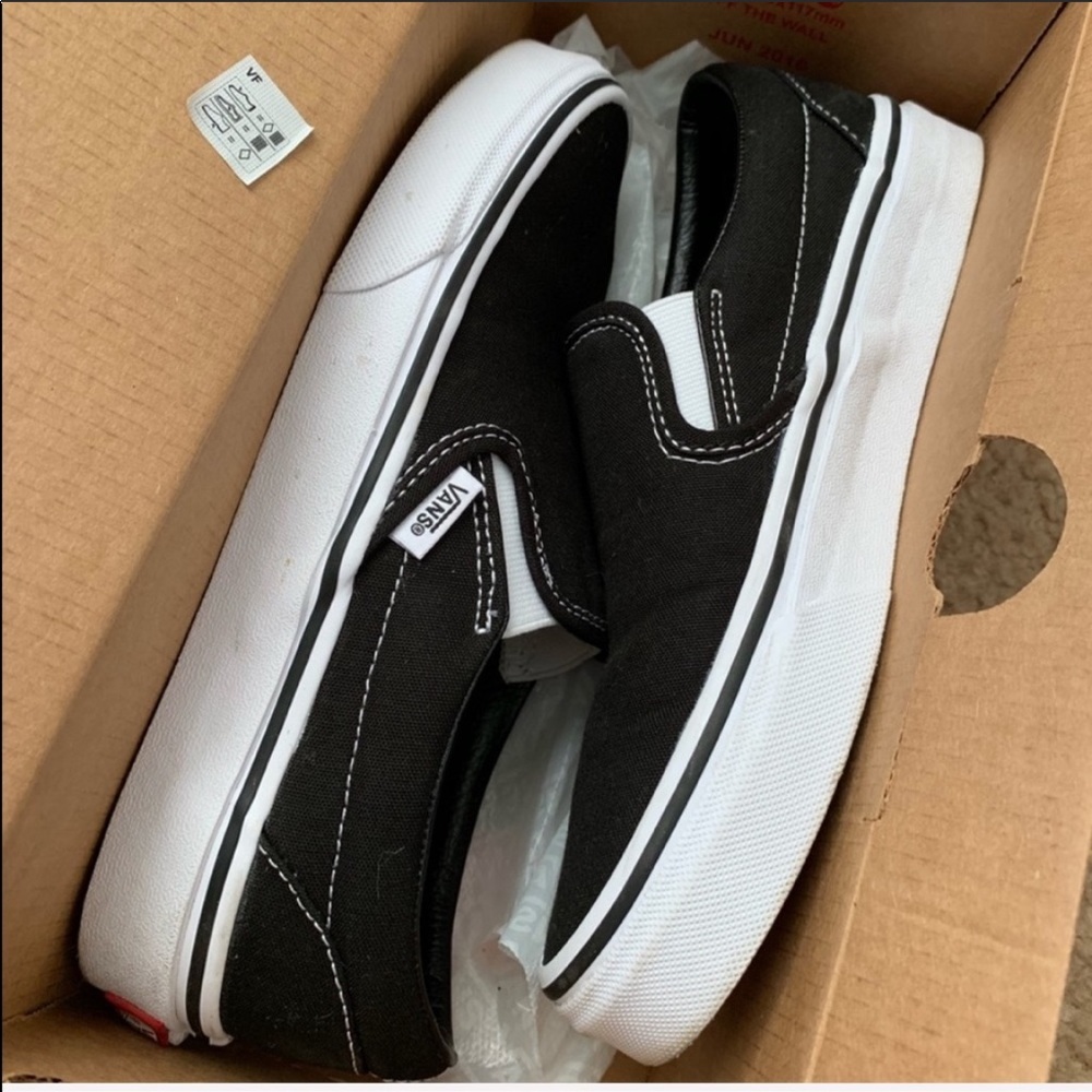 Black and White slip on vans